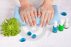 Woman's hands and nails with french manicure