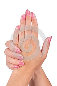 Woman& x27;s hands with pink nails manicure Isolated on white background.