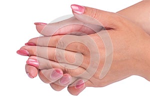Woman& x27;s hands with pink nails manicure Isolated on white background.
