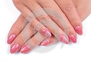 Woman& x27;s hands with pink nails manicure Isolated on white background.