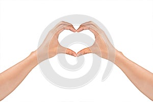 Woman`s hands shaping a heart symbol for valentine`s day or wedding isolated on white background