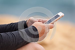 Woman`s Hands with Smartphone Texting