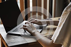 Woman`s hands typing on laptop keyboard. Study and work online, freelance. Self employed or freelance woman, girl