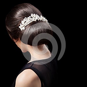 Woman's Head - Fashion Festive Coiffure with Pearls. Upsweep. photo