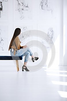 Woman`s leisure time in gallery