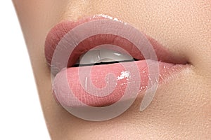 woman's lips. Beauty lips make-up. Beautiful make-up. Sensual open mouth. Lipstick and lip gloss. Natural full lips