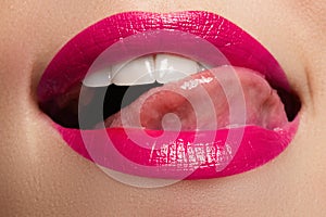 woman's lips. Beauty lips make-up. Beautiful make-up. Sensual open mouth. Lipstick and lip gloss. Natural full lips