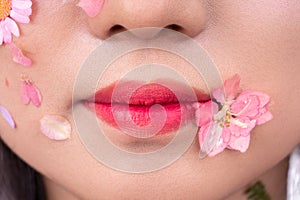 A woman`s lips with red lipstick