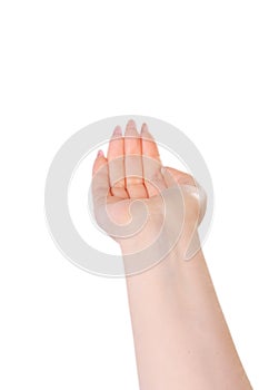 Woman`s palm making gesture while showing small amount of something on white isolated backgr