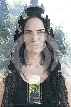 A woman's portrait merged with a Bali temple scene in a double exposure