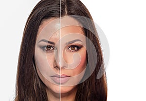 A woman`s portrait with retouched and without retouching is divided into half of the face.