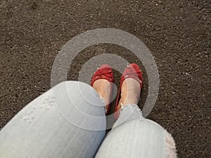 Woman `s shoe is on road