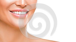 Woman`s smile with white healthy teeth, isolated on white background.