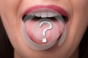 Woman`s Tongue With Question Mark Sign