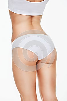 Woman`s torso close-up isolated on white background photo