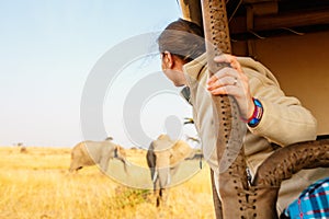 Woman on safari game drive