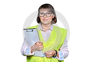 Woman in safety vest with fileholder looking at camera, white isolated background