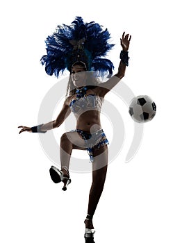 Woman samba dancer playing soccer silhouette