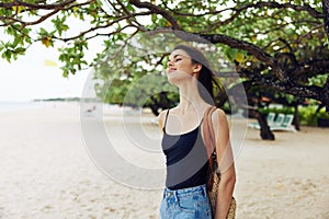 woman sand beach sea young nature ocean vacation copy-space smile summer