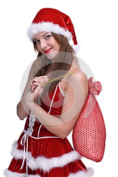 Woman in santa clause dress and gifts bag