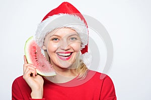 Woman santa hat hold slice watermelon. Christmas summer destinations. Tropical christmas concept. Exotic christmas