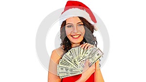 Woman in Santa hat holding money dollar.