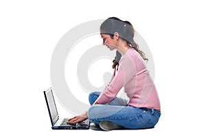 Woman sat using a laptop photo
