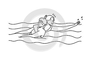 Woman saving man drowning in water