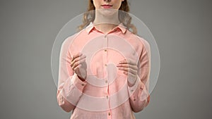 Woman saying Jesus in sign language, showing words in asl lesson, communication