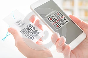 Woman scanning QR code