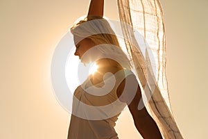 Woman with scarf feeling balanced