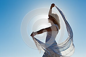 Woman with scarf feeling balanced