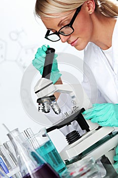 Woman scientist in chemical lab