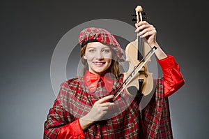 The woman in scottish clothing