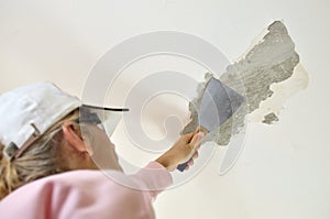 Woman with Scraping Tool