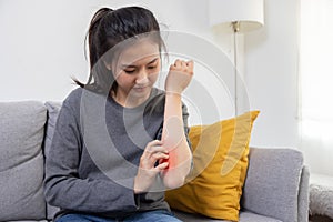 Woman Scratching her Arm Suffer from Allergy Itchy Skin