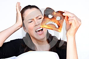 Woman scream at a burnt slice of toast