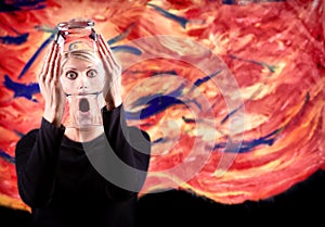 Woman screaming with distorted face