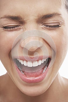 Woman Screaming With Eyes Closed