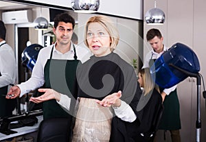 Woman screaming on hairdresser