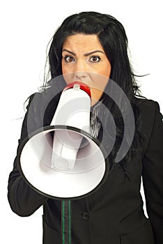 Woman screaming into loudspeaker