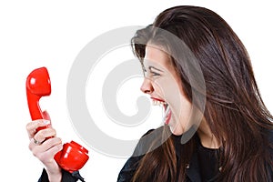 Woman screaming into telephone