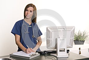 Woman in scrubs Female Nurse Workstation