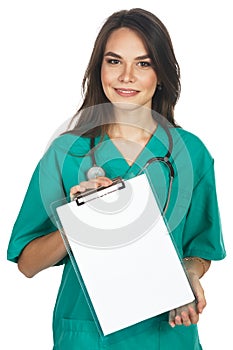 Woman is scrubs showing a blank clipboard sign