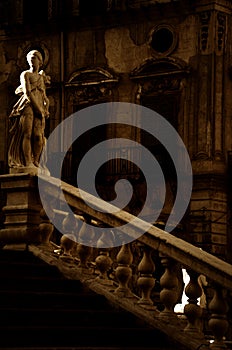 Woman sculpture at Piazza Pretoria square in Palermo in sepia color