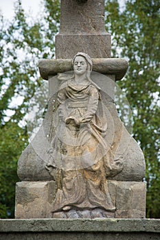 Woman sculpture in sandstone. Cervena Voda