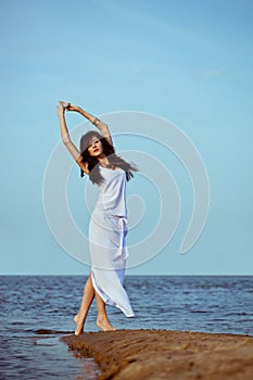 Woman on on the sea beach