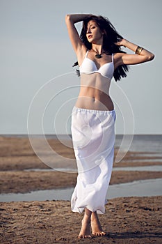 Woman on on the sea beach