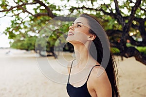 woman sea beach nature ocean vacation coast summer smile young sand