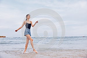 woman sea beach relax sunset smile young lifestyle summer travel running